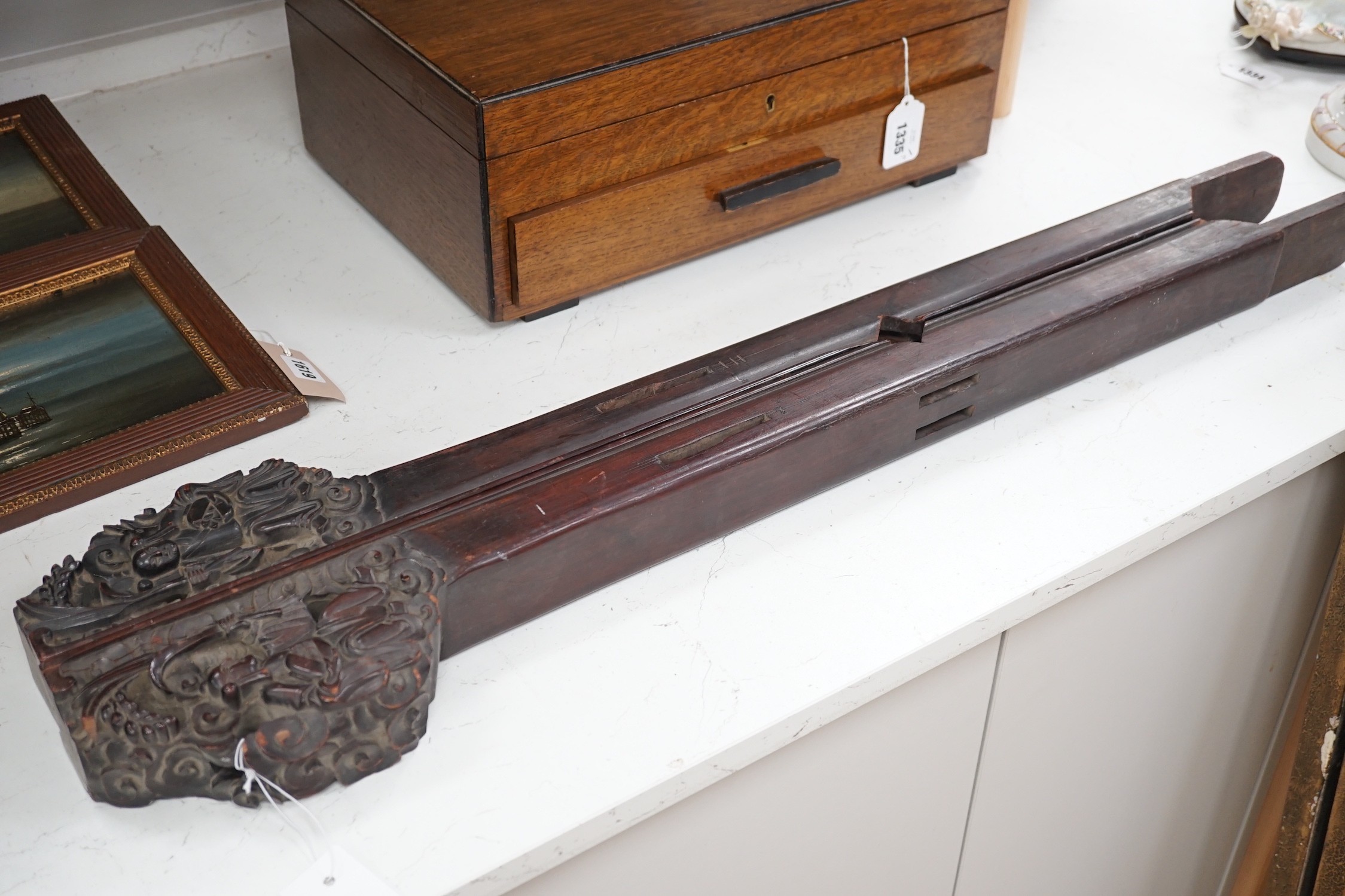 A pair of 19th century Chinese carved hardwood rails, 93cm